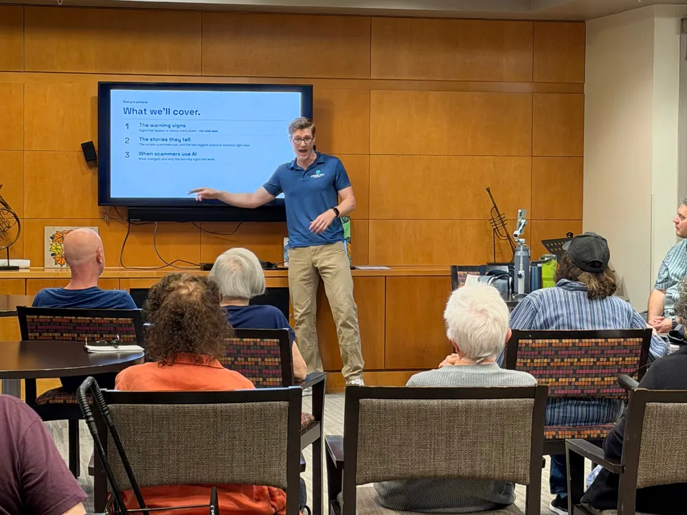 Elan Mauer teaching a room of adults during a live technology class